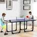 Kids playing table tennis on a blue 6ft split-design indoor ping pong table