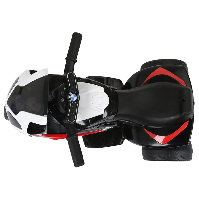 Top view of black and white children's ride-on toy motorcycle with BMW logo on handlebars