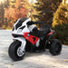 BMW RR children’s electric three-wheeler bike in red, white, and black on paved path with autumn foliage