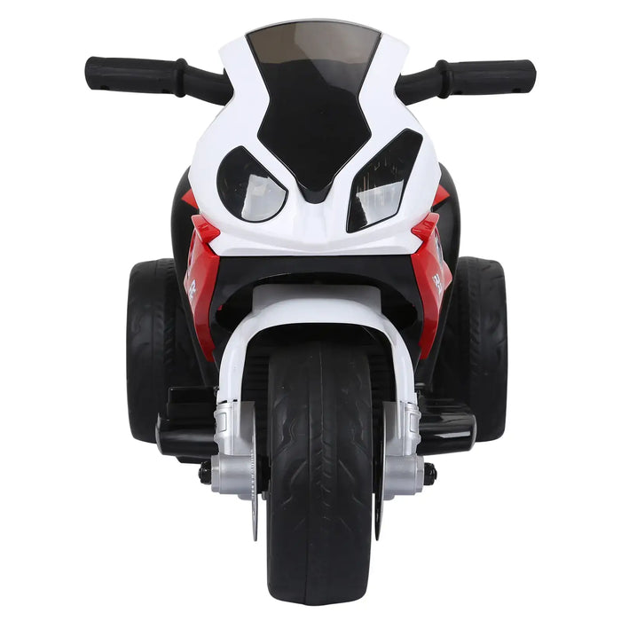 Front view of red and white kids electric ride-on motorcycle with black handlebars and wide tires