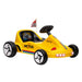Yellow toy go-kart with black wheels and red flag on a white background