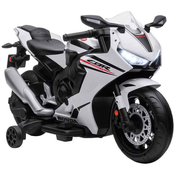 White and black Honda motorcycle toy on a white background
