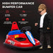 Red and blue kids bumper car with steering wheel, safety belt, and toddler standing beside