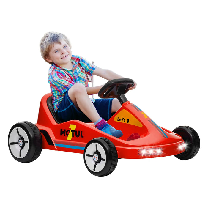 Child sitting in a red toy go-kart with 'Motul' branding on a white background