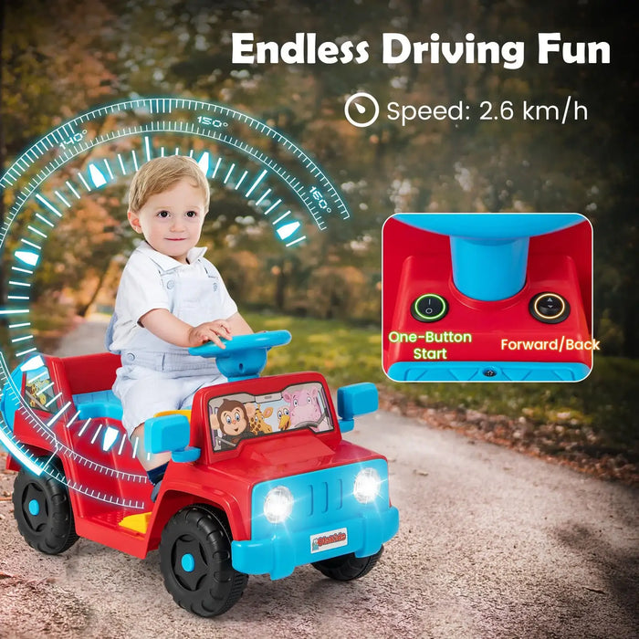 Toddler riding red and blue battery powered toy car on outdoor path with cartoon animal decals