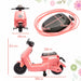 Pink toy scooter with measurements on a white background