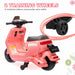 Pink toy scooter with training wheels on a white background