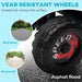 Close-up of a kids’ electric quad bike wear-resistant wheel on asphalt, with inset images showing suitability for brick roads and boardwalks.