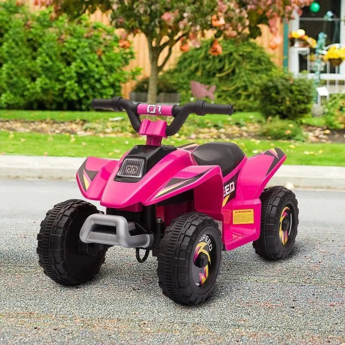 Pink 6V kids electric quad bike on sidewalk, outdoor toy vehicle for children