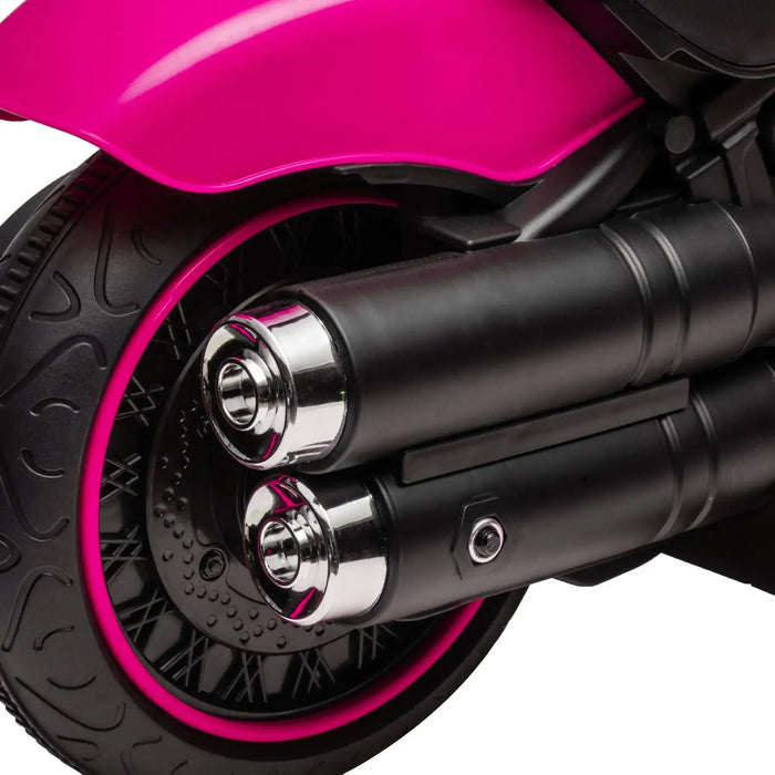 Close-up of pink kids' electric ride-on motorbike rear wheel with smooth traction tire