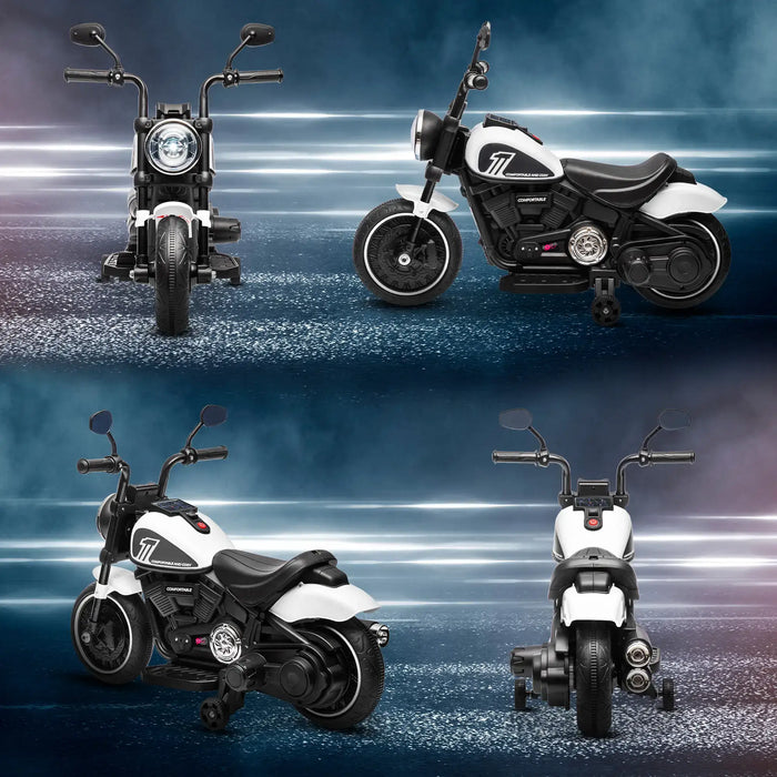 White and black electric kids motorcycle with training wheels shown from four angles on dark reflective floor
