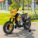 Yellow kids electric ride-on motorbike with training wheels in a park setting