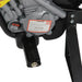 Close-up of 6V kids electric ride-on motorbike pedal, engine details, and warning label