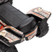 Close-up of black kids' electric ride-on ATV quad bike with racing stickers and rugged tires