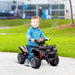 Child riding black 6V electric ride-on quad ATV bike with racing stickers outdoors