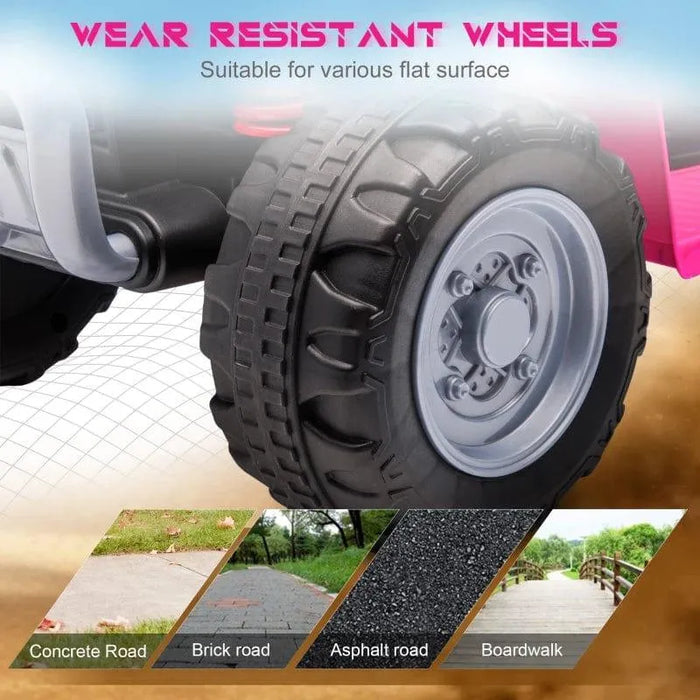 Close-up of pink kids' Honda ride-on quad bike wear-resistant wheel, suitable for concrete, brick, asphalt, and boardwalk surfaces.