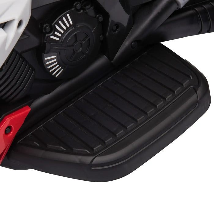 Close-up of a motorcycle footrest with a red accent on a white background