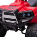 Red kids ride-on quad ATV bike with headlights and rugged wheels close-up