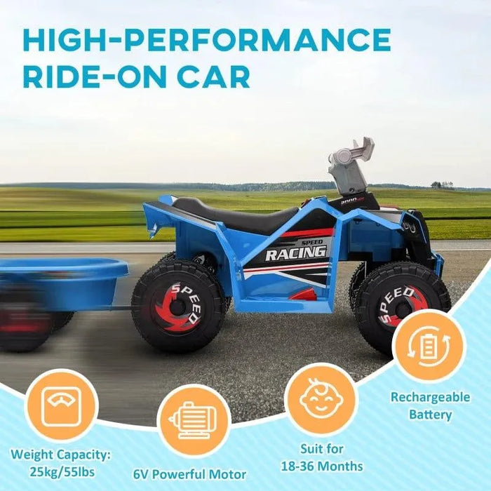 Blue kids ride-on quad bike with trailer, racing decals, and large wheels on a road