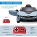 Blue BMW i8 Coupe kids electric ride-on car with two opening doors and remote control guide.