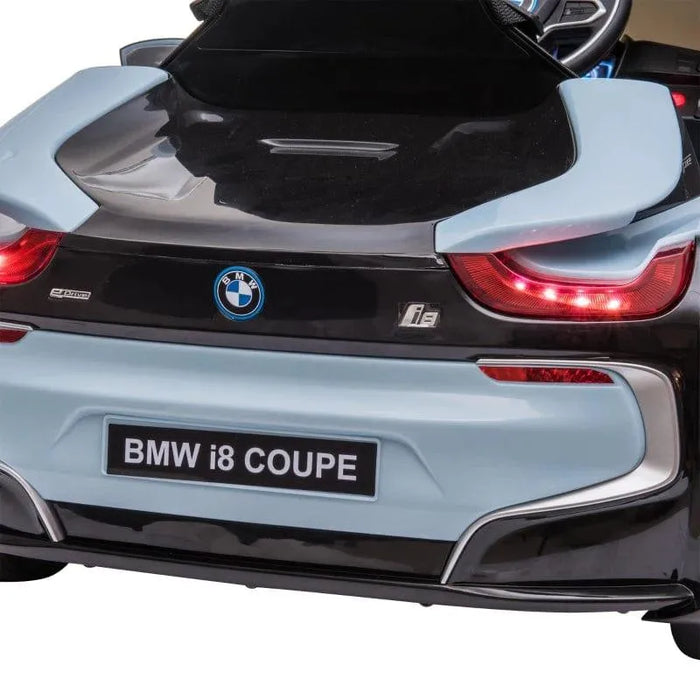 Rear view of blue BMW i8 Coupe kids electric ride-on car with LED tail lights