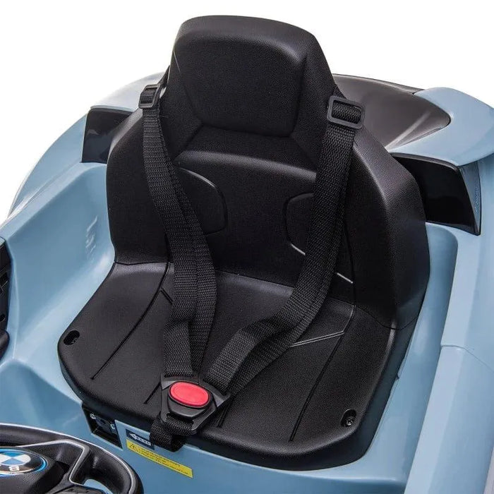 Black seat with seatbelt in blue BMW i8 kids electric ride on car