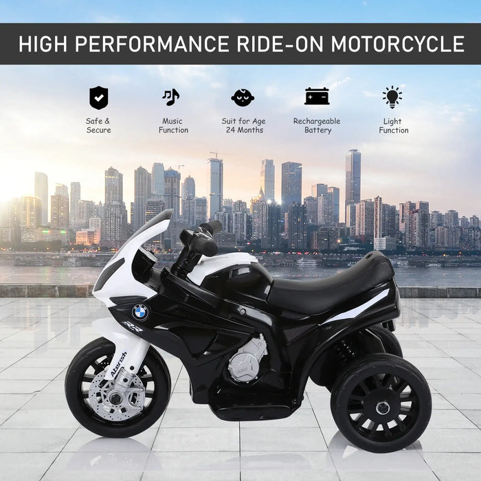 Black BMW kids electric motorbike with realistic lights, city skyline background, ride-on toy
