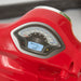 Red Vespa kids electric ride-on motorbike dashboard close-up with speedometer and display
