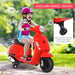 Child riding red Vespa kids electric ride-on motorcycle with helmet and training wheels outdoors