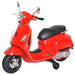 Red Vespa kids electric ride-on motorcycle with training wheels and LED lights