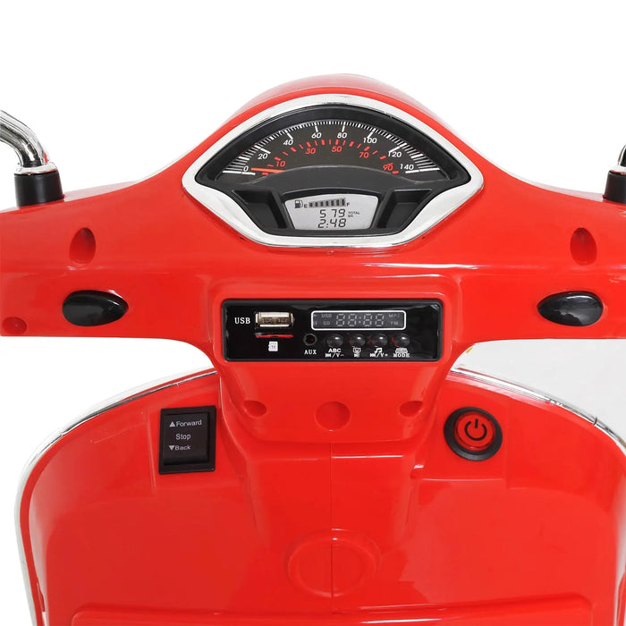 Red Vespa kids electric ride-on motorcycle dashboard with speedometer and USB port