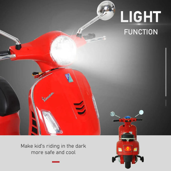 Red kids' electric Vespa ride-on motorcycle with LED headlights and training wheels
