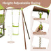 Height adjustable green and brown outdoor swing set with solid carabiners, adjustment devices, and multi-strand ropes