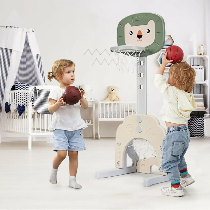 Two children playing with basketballs in a room with a baby crib and toys.