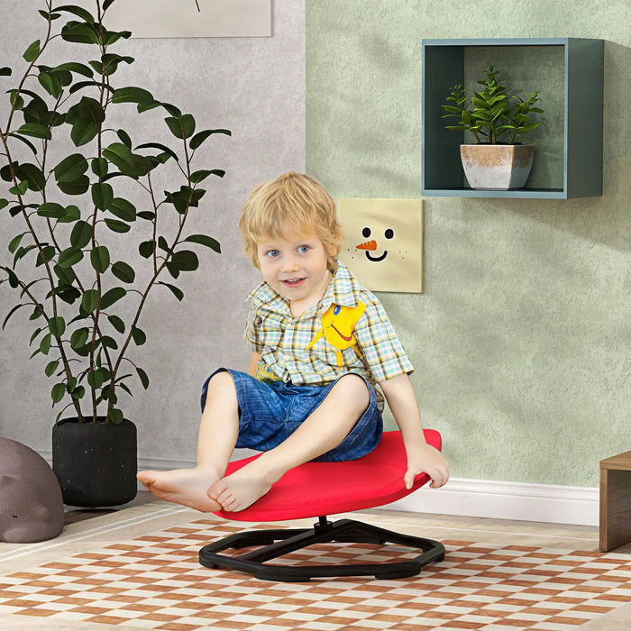 Child sitting on a red chair in a room with plants and a snowman decoration.