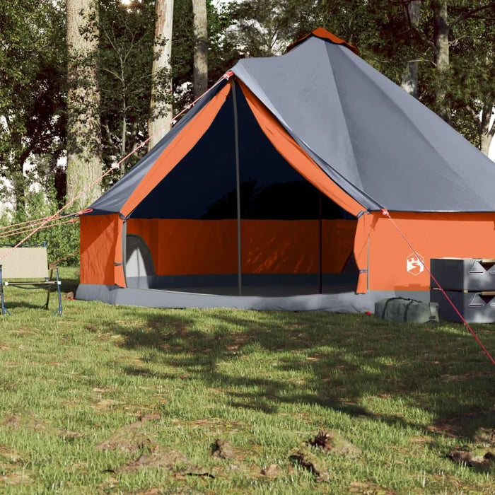 8-person family tipi tent in grey and orange with E-port set up outdoors in forest