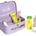 Kids wooden toiletry set with purple case, comb, shampoo, body lotion, and bath gel bottles