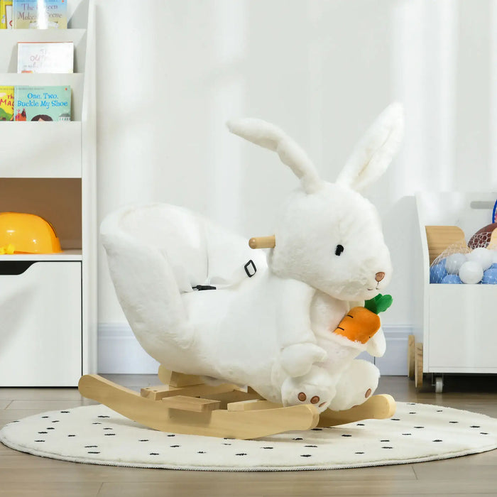 White plush rocking horse with rabbit design on a wooden base in a nursery setting.