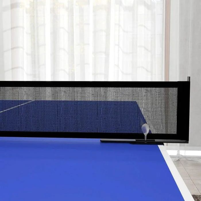 Blue table tennis table with net and ball in modern indoor setting