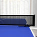 Blue table tennis table with net and ball in modern indoor setting