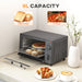 Toaster oven with 9L capacity shown with toast, pizza, and pastries on a countertop.