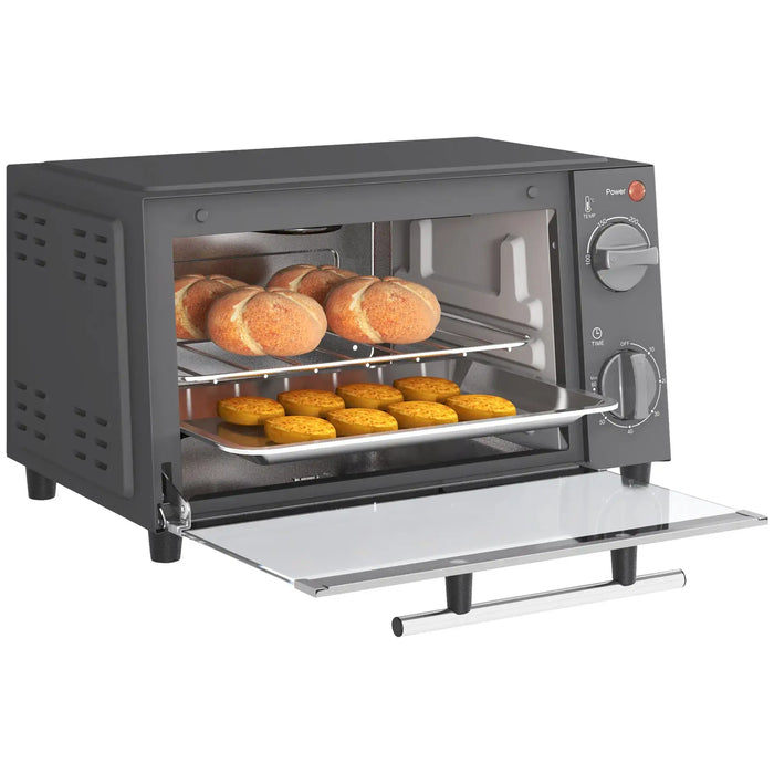 Toaster oven with bread and pastries on a white background