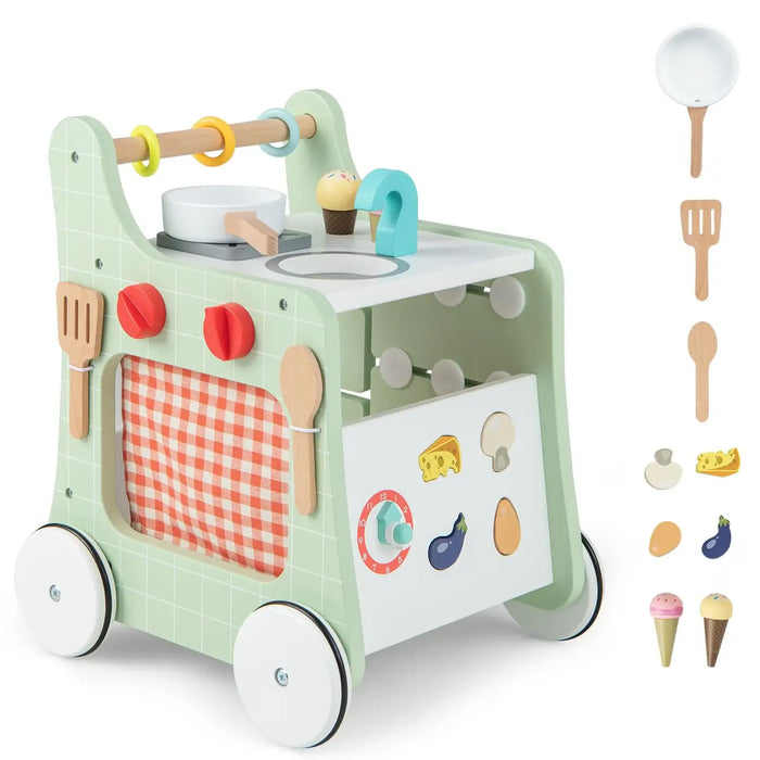 Children's toy kitchen set with various accessories on a white background