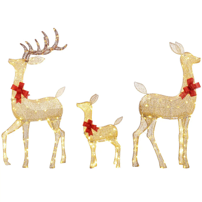 Set of three golden lit Christmas reindeer decorations with red bow accents, including stag, doe, and fawn