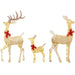 Set of three golden lit Christmas reindeer decorations with red bow accents, including stag, doe, and fawn