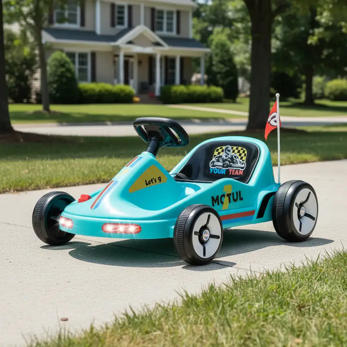 Toy race car with 'Motul' branding in a street setting in front of a house