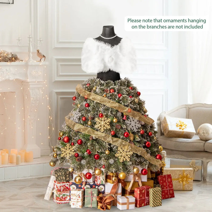 Christmas tree decorated as a festive dress on a mannequin with red and gold ornaments, surrounded by wrapped gifts