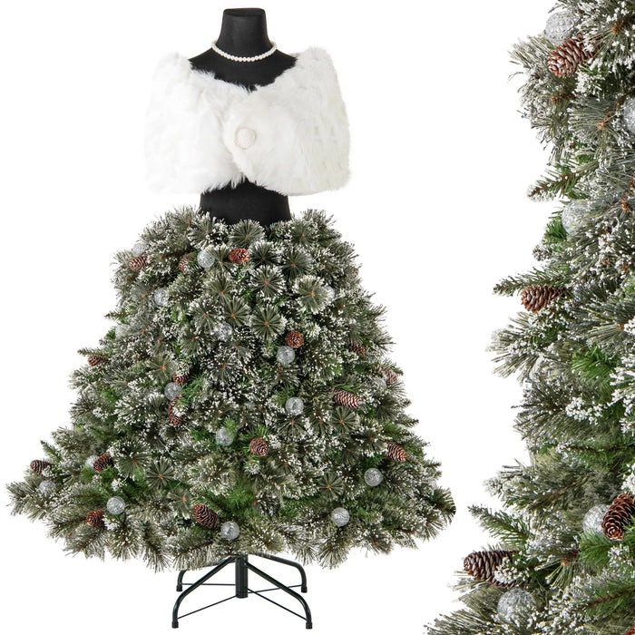 Artificial Christmas tree styled as a dress on a mannequin with white fur wrap and decorated with pine cones and silver baubles