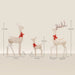 Set of three decorative light-up reindeer with red bows and height measurements on beige background
