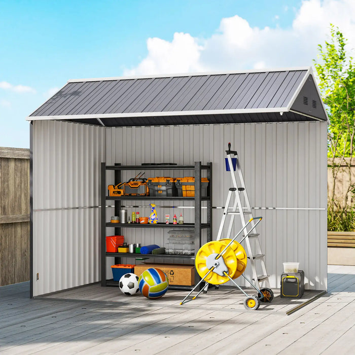 Outdoor metal storage shed with shelves, tools, sports balls, and a ladder on a wooden deck